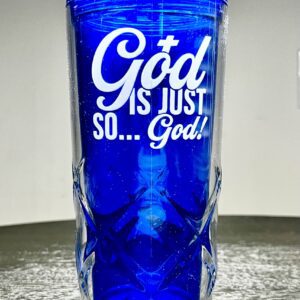 A blue glass with the words god is just so... God ! on it.